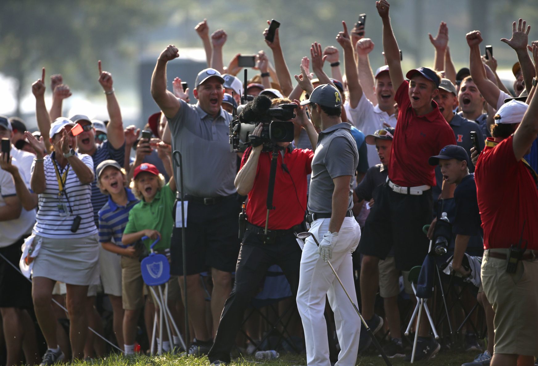 Rain-delayed second round continues of the 100th PGA Championship